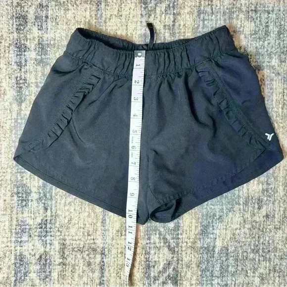 Old Navy Girl’s Ruffle-Front Dolphin-Hem Run Shorts in Black Size Medium (8) - Picture 6 of 11